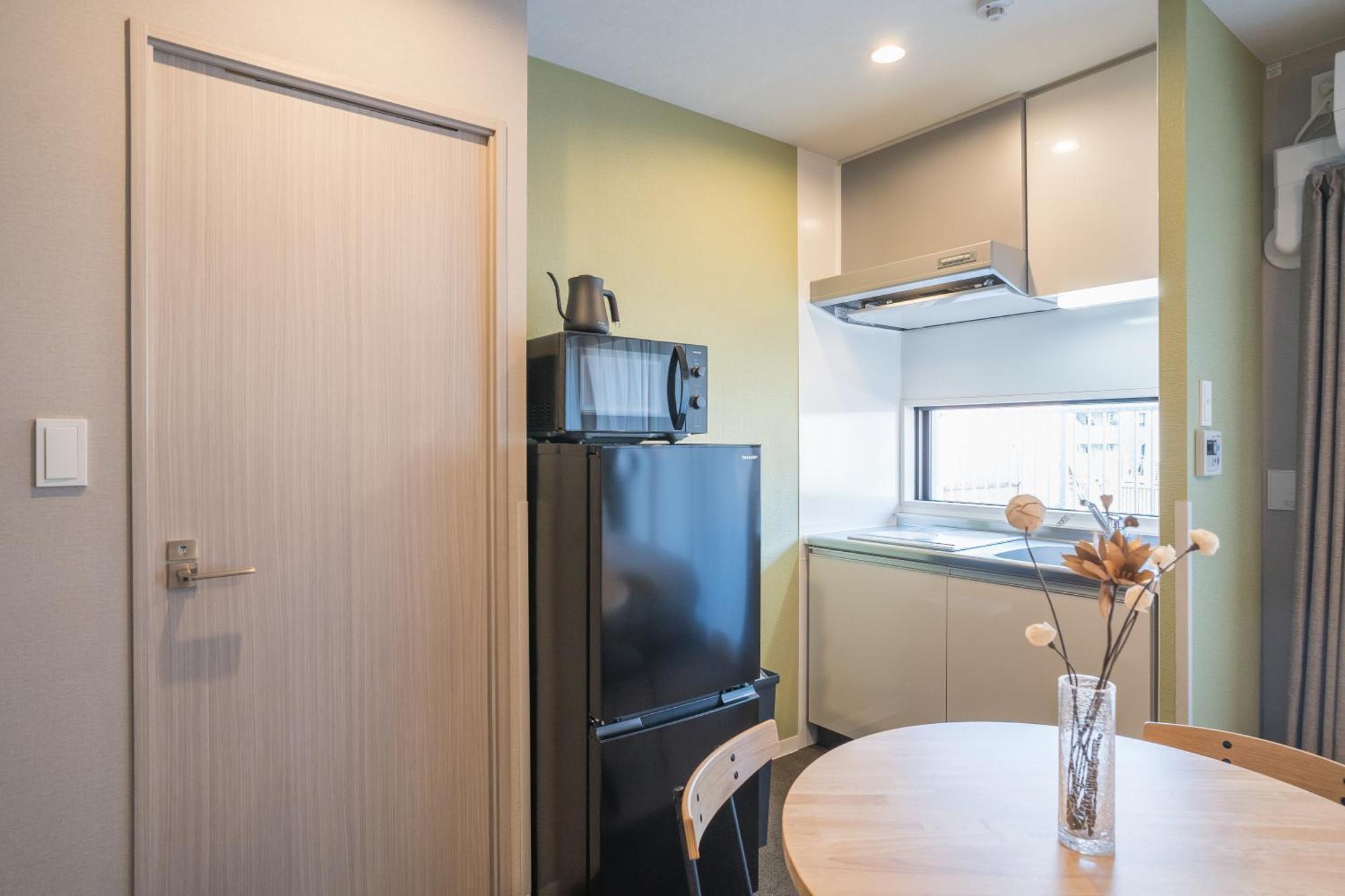 Apartment Hotel 11 Umeda Kamiyama 大阪 客房 照片